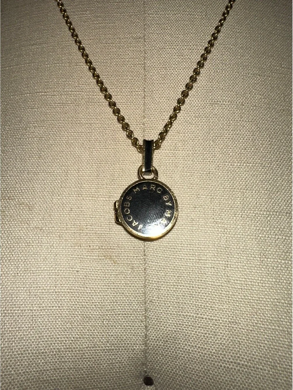 MARC BY MARC JACOBS Gold and Black Round Pendant Locket